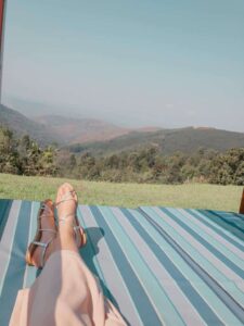 Fay relaxing in qunu falls with the mountain views